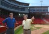 Lance Taylor, left, Arkansas Activities Association director, shown here speaking with Fayetteville Public School Superintendent Bobby New, believes moving the All-Star games to central Arkansas will increase participation.