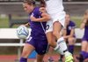 Bentonville’s Brittani Reagan, right, and Fayetteville’s Lindsay Bordelon battle for the ball during Saturday’s semifinal match at the Class 7A State Tournament in Fort Smith.
