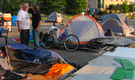 Occupiers await arrests after permit expires