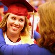 Gentry senior Shaumbry Patterson smiles as her mother, Teresa Patterson, adjusts her honors stole on Friday night. Shaumbry was the salutatorian in Gentry's graduating class.