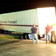 This truck driver found himself in a bit of a dilemma Saturday night after attempting to turn out of the Little Debbie Store parking lot in Gentry and dropping his back wheels into the ditch. He needed the assistance of a Decatur Salvage wrecker to lift up the back of his trailer enough to get his trailer wheels back on the ground. After a little help from the wrecker and the expert driving of Decatur Salvage owner Tommy Turner, the driver was able to get back on the road again.