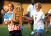 Pulaski Academy’s Jordan Hughes (left) and Rachel Rickenbach display the Class 4A girls soccer championship trophy following the Bruins’ victory over Episcopal Collegiate on Friday in Fayetteville. 