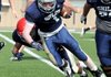 Shiloh Christian junior Chris Cox (1) charges upfield during practice on May 14 at Champions Field in Springdale.