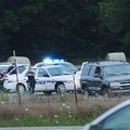 Fayetteville police surround a vehicle ater a reported shooting.