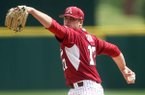 Arkansas starting pitcher Barrett Astin delivers against Kentucky Saturday, April 14, 2012 at Baum Stadium in Fayetteville.