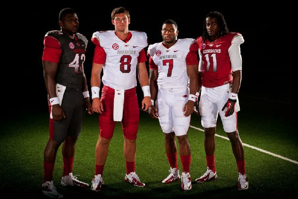 
The University of Arkansas on Wednesday released images of its new football uniforms.

Arkansas Razorbacks, left to right, Tenarius Wright, Tyler Wilson, Knile Davis and Cobi Hamilton model the university's new football uniforms, which were unveiled Wednesday, June 13....Courtesy University of Arkansas