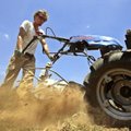 Ryan Norman, with the Delta Garden Study project, uses a tiller at Cloverdale Middle School. A team ...