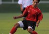 Erick Banuelos of Rogers Heritage stops the ball Tuesday during the Arkansas High School Coaches Association All-Star boys soccer game at Razorback Field in Fayetteville.