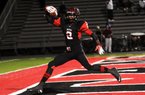 Nathan Holmes of Port Arthur (Texas) Memorial scores a touchdown during a game with West Brook last season. Holmes scored 14 touchdowns last fall, carrying the ball 143 times for 1,316 yards and catching 8 passes for 186 yards. He rushed for 891 yards a 7.5 yards-per-carry average as a junior. 