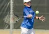 Patrick Kypson hits a shot during Wednesday’s 6-4, 7-5 championship victory over top-seeded Zeke Clark at the USTA National Open 14-under tournament at Burns Park Tennis Center in North Little Rock. 