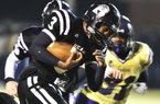 Former Bearden quarterback Defonta Lowe is working out this summer as a free safety at Arkansas, taking a criminal justice class and acclimating himself to UA campus life. 