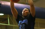 7/11/12
Arkansas Democrat-Gazette/STEPHEN B. THORNTON
King McClure of the Texas Titans slams the ball home during their game against the Arkansas Soldierz in the AAU tournament in Little Rock last summer. 
