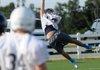 Nick Byrne of Springdale Har-Ber jumps for a pass Monday during 7-on-7 scrimmage at Springdale Har-Ber High School.
