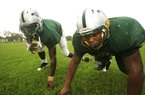 JaMichael Winston (left) and Darius Philon, high school teammates at Prichard, Ala., both signed with Arkansas, although Philon nearly wound up at Alabama. 