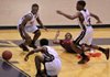 Trevon Wright (center) of Hokies Elite loses the ball while surrounded by Memphis Love defenders Gregory McKnight (top left) Brandon Lee (bottom) and Kendall Jefferson during their AAU 15-Under game Saturday at Pulaski Academy. 