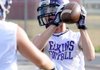 Elkins’ Cody Downum grabs a pass in an NWA Passing League 7-on-7 game at Tiger Stadium in Bentonville on Monday.