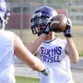 Elkins’ Cody Downum grabs a pass in an NWA Passing League 7-on-7 game at Tiger Stadium in Bentonvill...