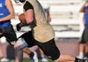 Craig Brannan, West Fork senior, runs upfield against Rogers during a 7-on-7 game Monday at Bulldog Stadium in Springdale.