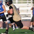 Craig Brannan, West Fork senior, runs upfield against Rogers during a 7-on-7 game Monday at Bulldog ...