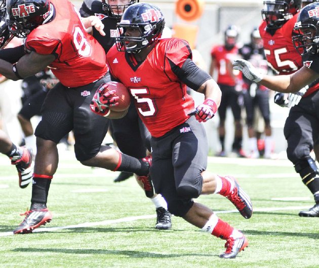 courtesy-arkansas-statehannah-dolle-arkansas-state-running-back-michael-dyer-who-transferred-from-auburn-looks-for-running-room-in-the-red-wolves-spring-game-at-asu-stadium-in-jonesboro-asu-announced-sunday-evening-that-dyer-has-been-dismissed-from-the-team-for-violating-team-rules