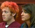 In this image taken from video provided by KUSA.com, James Holmes, left, the suspected gunman the Au