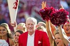 Former Arkansas athletic director Frank Broyles is shown here calling the hogs with the Arkansas spirit squad before the start of an NCAA college football game against Auburn in 2011. Frank Broyles didn’t have to be a native Arkansan to be a lifetime Arkie.
