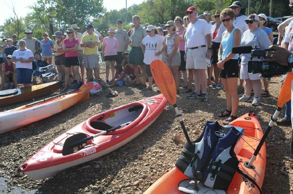 About 75 kayakers heard Herbert's instruction.