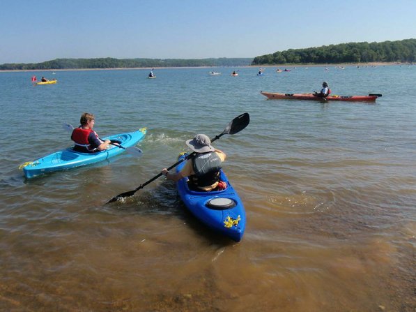 Paddlers head out for the trip around Bear Island on Beaver Lake.