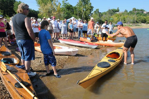Herbert, right, shares his kayaking knowledge at the free seminar.