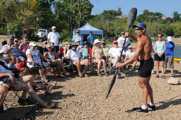 Mike Herbert demonstrates efficient paddling technique during a kayak clinic on Saturday at Beaver Lake at the Arkansas 12 bridge. About 75 kayakers attended the event.