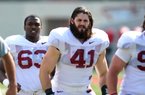 After spending two years at a California community college, Austin Flynn (41) is ready to make his mark at Arkansas. He was among the top defensive ends in spring practice. 