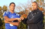 Arkansas defensive back signee Ray Buchanan Jr. (left) takes his name and his game from his father, Ray Buchanan Sr. (right). 