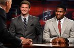 Arkansas quarterback Tyler Wilson (left) and running back Knile Davis talk with ESPN’s David Lloyd on the set of SportsCenter on Wednesday in Bristol, Conn. Both are considered candidates to win the Heisman Trophy heading into this season. 