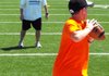 Dowell Loggains (back), who was a walk-on quarterback for the Arkansas Razorbacks in 2000, is making a name for himself in the NFL as the Tennessee Titans’ quarterbacks coach. “Dowell’s reputation has grown as one of the bright young coaches in the NFL,” ESPN analyst Chris Mortensen said. “He’s held in high regard throughout the league.” 