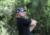 Cade Brown, 16, of Springdale High School watches where his golf ball lands Thursday during practice at the Springdale Country Club. Brown has been playing golf for several years, originally learning how to play the game from family members.