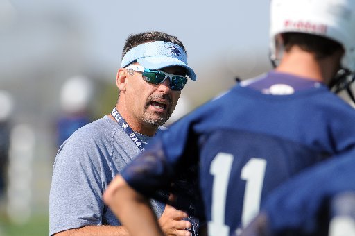 
                               
                                  Photo by Anthony Reyes&mdash;
                               
                           
                           6. Chris Wood, Springdale Har-Ber - Wood is the first coach in the history of Har-Ber and has built a solid foundation. The Wildcats are 51-22 under Wood, winning the Class 7A state championship in 2009 and finishing runner-up two years earlier. Wood also won a state championship at Shiloh Christian in 2001 and led Nashville to a conference championship in 2004. He served as offensive coordinator for Springdale's 2005 state championship team, considered by many the best in Arkansas' history. 