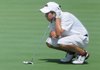 Palmer Hays, 12, from Fayetteville lines up a putt on the first hole Tuesday during the Arkansas State Golf Association Tournament at Pinnacle Country Club In Rogers.