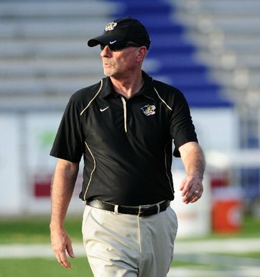 
                               
                                   Photo by Jimmy Jones&mdash;
                               
                           
                           1. Barry Lunney, Bentonville - Lunney has been the architect of two of the state's best football programs during a career that has spanned a quarter-century. After winning four state championships at Fort Smith Southside, Lunney was hired at Bentonville in 2005. The Tigers won state championships in 2008 and 2010, and finished runner-up last season. Bentonville has won 55 games since 2007 - more than any program in Class 7A - and at least a share of five consecutive 7A-West championships. Lunney has won 216 career games, 13 conference championships and has a 38-12 record in the playoffs. 