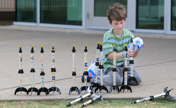 
                               
                                  Photo by Spencer Tirey&mdash;
                               
                           
                           Adam Stanton plays with some Estes Rockets.