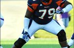 Katy (Texas) Seven Lakes offensive lineman Caleb Benenoch credits Arkansas offensive line coach Chris Klenakis for much of his interest in the Razorbacks. Video available at arkansasonline.com/videos. 