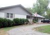 A home at 132 West Sycamore is the site of a homicide investigation Friday, Aug. 3, 2012 in Fayetteville. Officers responded to a report of a shooting at 1:41 a.m. where a man was shot and later died at Washington Regional Medical Center.
