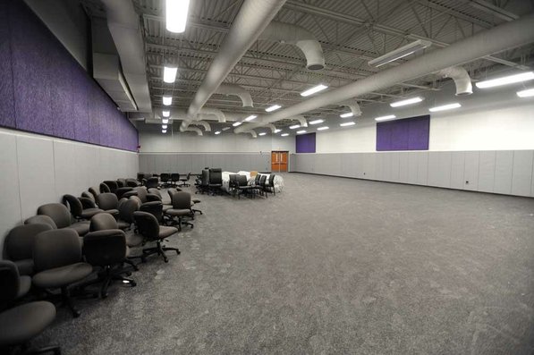 
                               
                                  Photo by Andy Shupe&mdash;
                               
                           
                           Officials walk through the wrestling practice facility Thursday, Aug. 3, 2012, during a tour of the additions to the Fayetteville High School building.