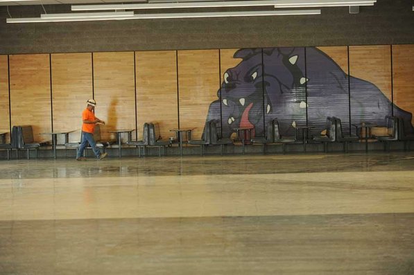 
                               
                                  Photo by Andy Shupe&mdash;
                               
                           
                           Officials walk through the cafeteria Thursday, Aug. 3, 2012, during a tour of the additions to the Fayetteville High School building.