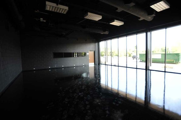 
                               
                                  Photo by Andy Shupe&mdash;
                               
                           
                           Officials walk through the television studio Thursday, Aug. 3, 2012, during a tour of the additions to the Fayetteville High School building.