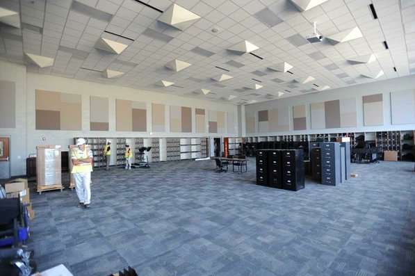 
                               
                                  Photo by Andy Shupe&mdash;
                               
                           
                           Officials walk through the band room Thursday, Aug. 3, 2012, during a tour of the additions to the Fayetteville High School building.