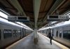 A passenger sets out to board an Amtrak Acela train at Union Station in Washington. 