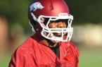 Arkansas fullback Kiero Small, who spent most of the 2011 season as a blocker, could play defense this year, Coach John L. Smith said. Video available at arkansasonline.com/videos. 
