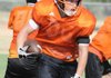 Gravette’s Peyton Rose runs the ball during practice Thursday. 
