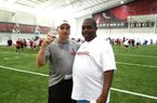 Arkansas defensive line coach Kevin Peoples first met Harris Wilson (right), affectionately known as “Coach Black,” in 1996 as an assistant at Northwestern State in Natchitoches, La. “We focus so much on our problems and focus on so much on negative things,” Arkansas defensive coordinator Paul Haynes said. “Then you get a guy that’s always in a good mood, always saying the right things. It’s refreshing.”

