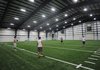 Har-Ber Football Players, Nick Byrne, from left, Ryan Peckham, Brock Dassero and Peyton Squires plays a game of two man football Wednesday, Aug. 2, 2012, in the school new practice facility.